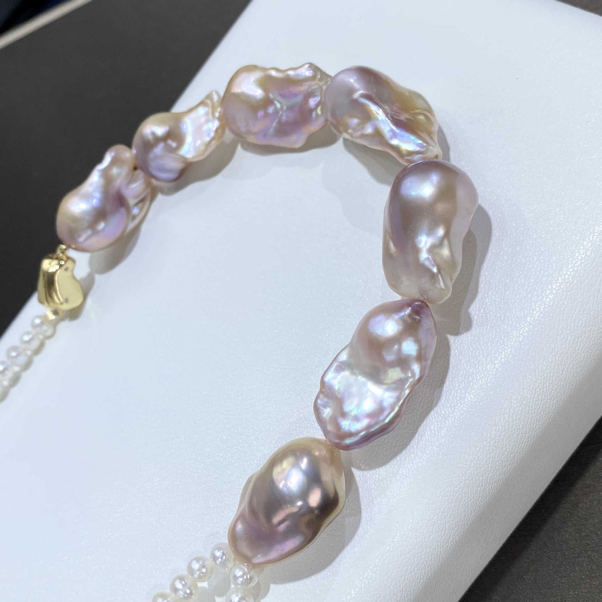 Baroque Cultured Pearl Necklace with large irregular freshwater pearls in lustrous mixed natural tones and smaller pearls