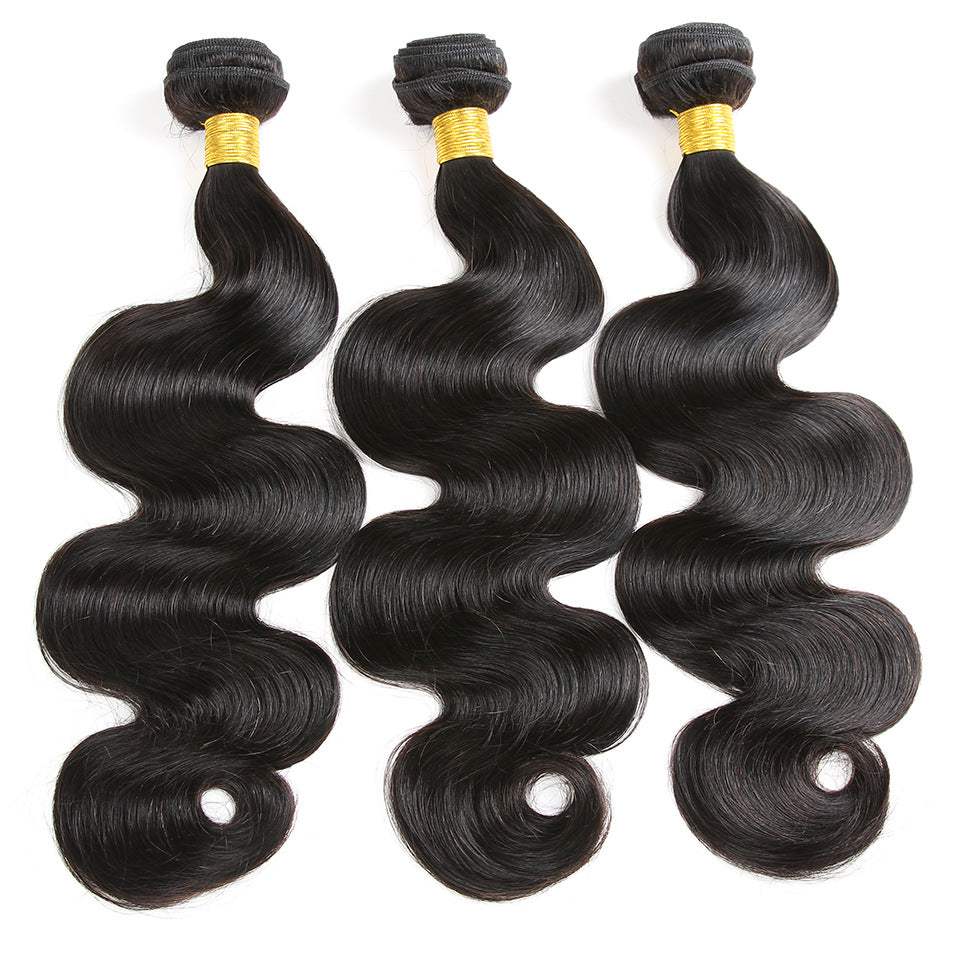 Body Wave Bundle Sets of three black human hair wefts with glossy S-wave texture and tied tops