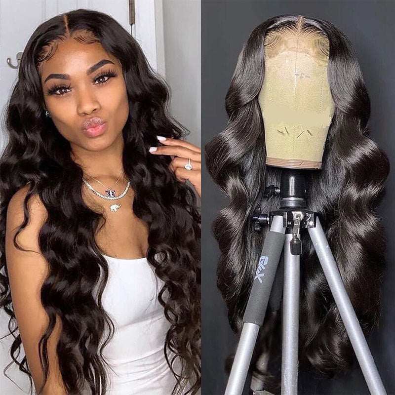 Loose Deep Wave 13x4 Transparent Lace Wig in glossy black human hair, with long defined waves and a natural-looking lace hairline