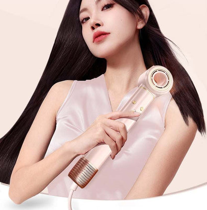 1300W Ionic Hair Dryer with Cool Shot in pink, with a round brush-style nozzle and metallic vent