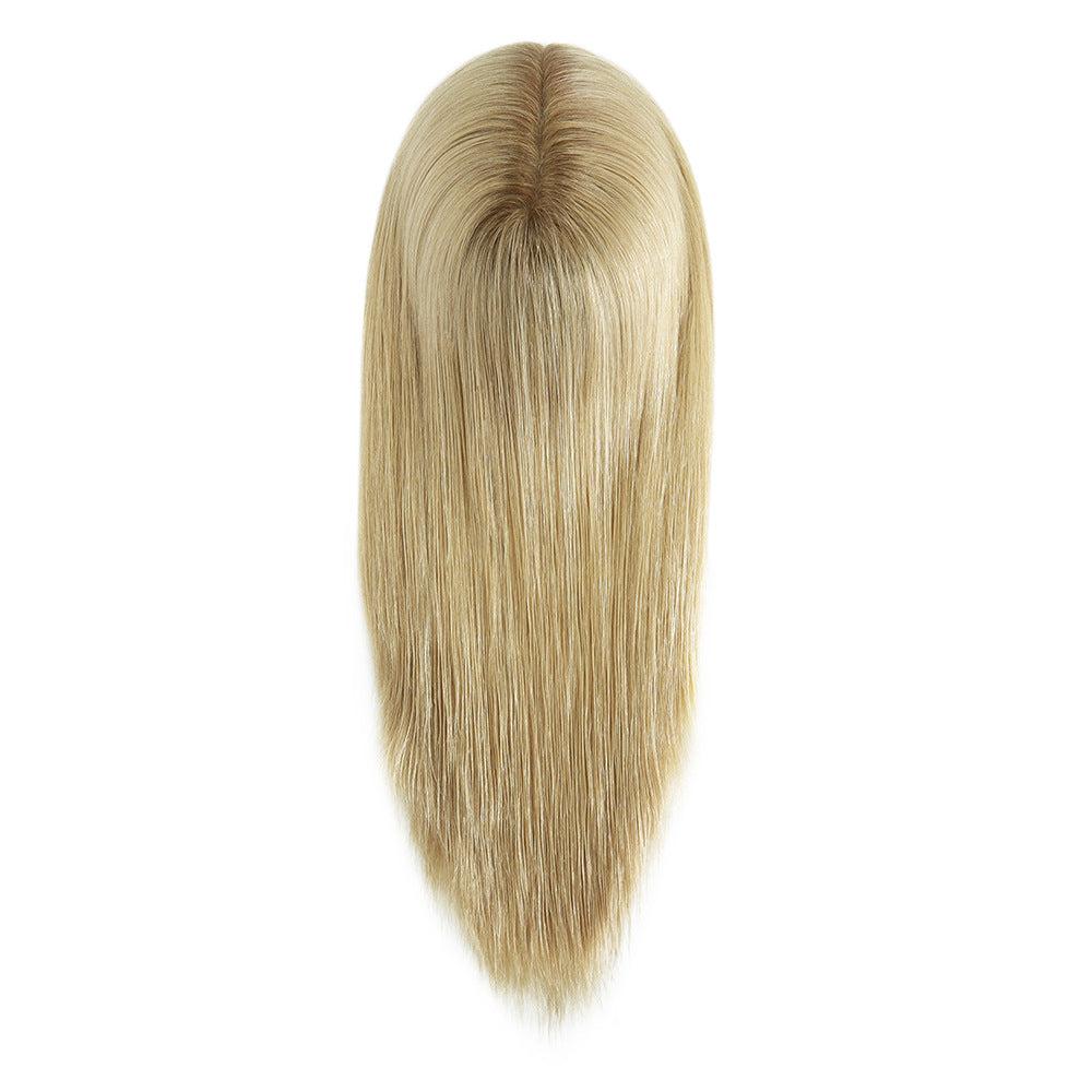 7x9 Human Hair Topper in light blonde human hair with a natural centre part and long, straight tapered lengths