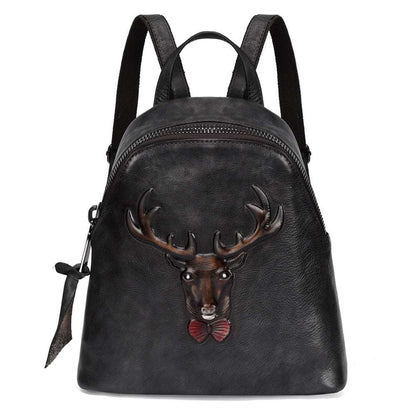 Bark-Grain Leather Backpack in black leather with a zip closure and raised deer head bow-tie design