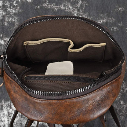 Bark-Grain Leather Backpack in brown hand-rubbed leather with open zip top and organised interior pockets