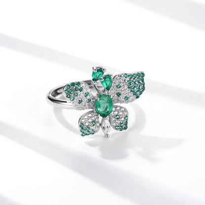 Butterfly Ring in platinum-plated sterling silver with green oval gemstone and pavé butterfly wings