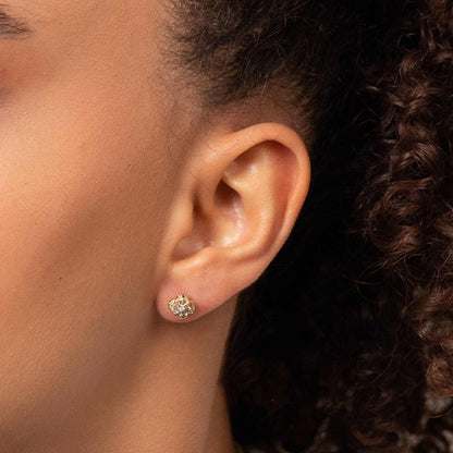 Elements Gold flower stud earring in yellow gold with baguette and round-cut diamond details