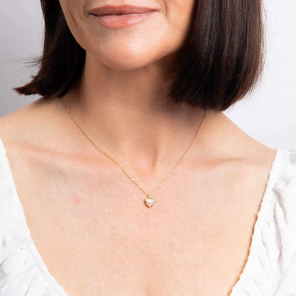 Elements Gold Pearl Necklace in yellow gold with a single pearl in a delicate petal-shaped pendant