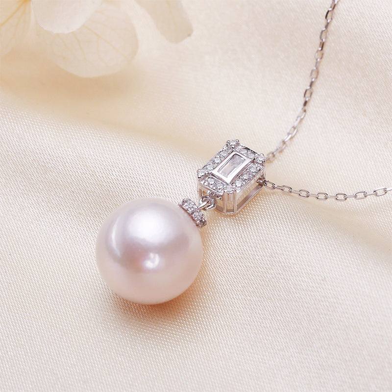 Freshwater Pearl Pendant Necklace with a round white pearl and silver rectangular cubic zirconia setting
