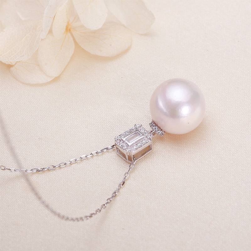Freshwater Pearl Pendant Necklace with a round white pearl and sparkling cubic zirconia bar in sterling silver