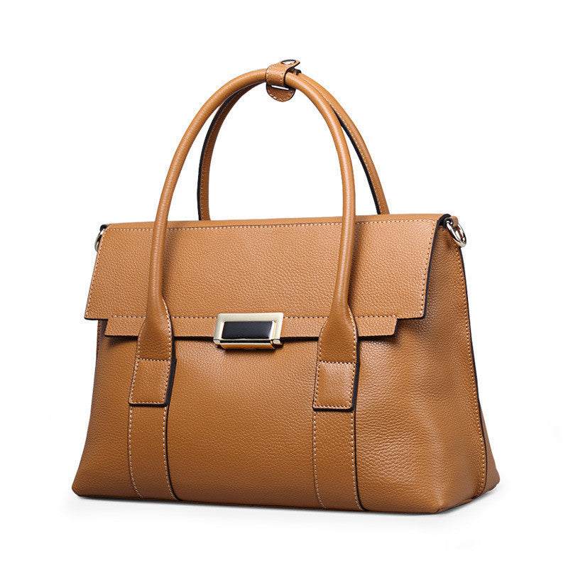 Full-Grain Cowhide brown leather shoulder bag with twin handles, structured shape and polished clasp