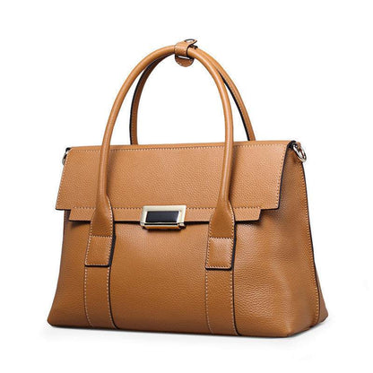 Full-Grain Cowhide brown leather shoulder bag with twin handles, structured shape and polished clasp
