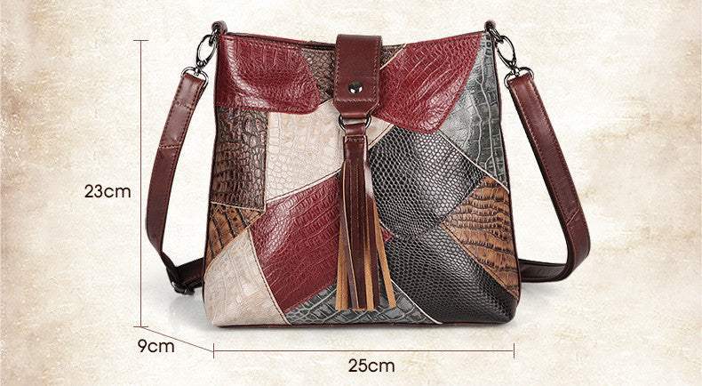 Full-Grain Leather Bucket Bag in burgundy, brown and cream patchwork with textured panels and front tassel
