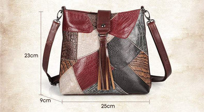 Full-Grain Leather Bucket Bag in burgundy, brown and cream patchwork with textured panels and front tassel