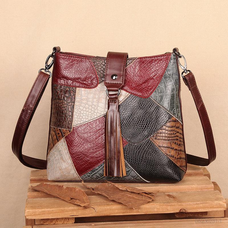 Full-Grain Leather Bucket Bag in multicolour textured leather with patchwork panels, flap closure and long front tassel