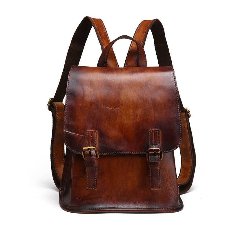Hand-Painted Cowhide Leather Backpack in rich brown leather with a smooth flap, buckled straps and compact shape