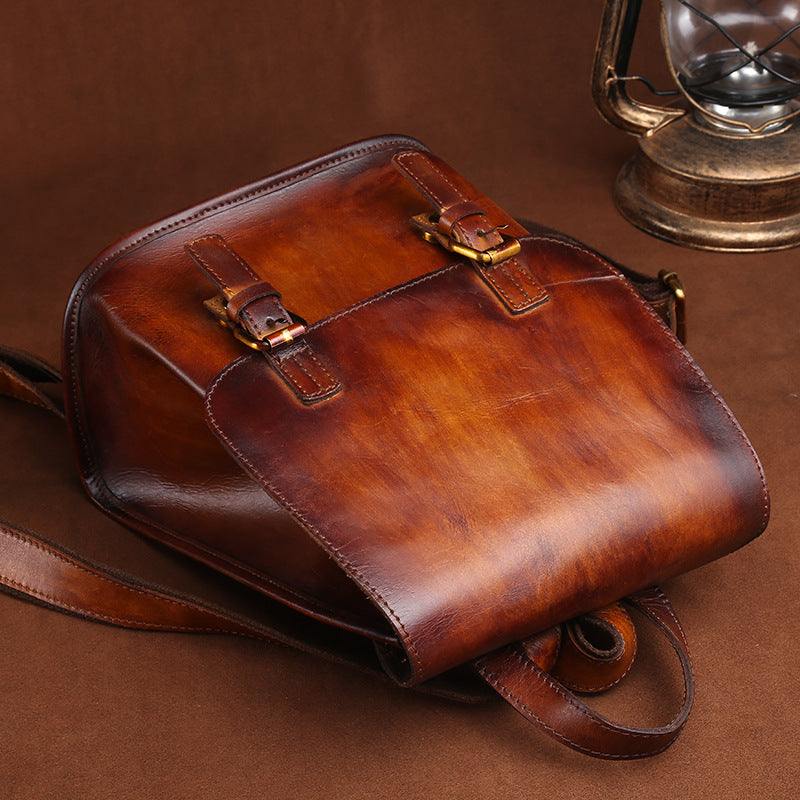Hand-Painted Cowhide Leather Backpack in rich retro brown leather with hand-painted shading, flap and buckle details