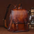 Hand-Painted Cowhide Leather Backpack in retro brown leather with smooth finish, flap closure and buckle straps