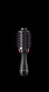 Hot Air Styling Comb with black handle, metallic barrel, and dense black bristles with pink tips