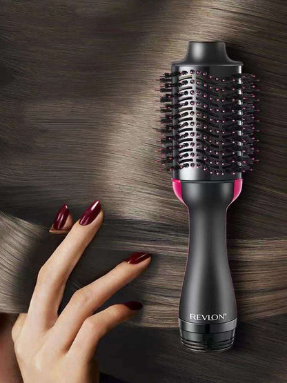 Hot Air Styling Comb with black ceramic barrel, pink accents, bristle teeth and ergonomic handle
