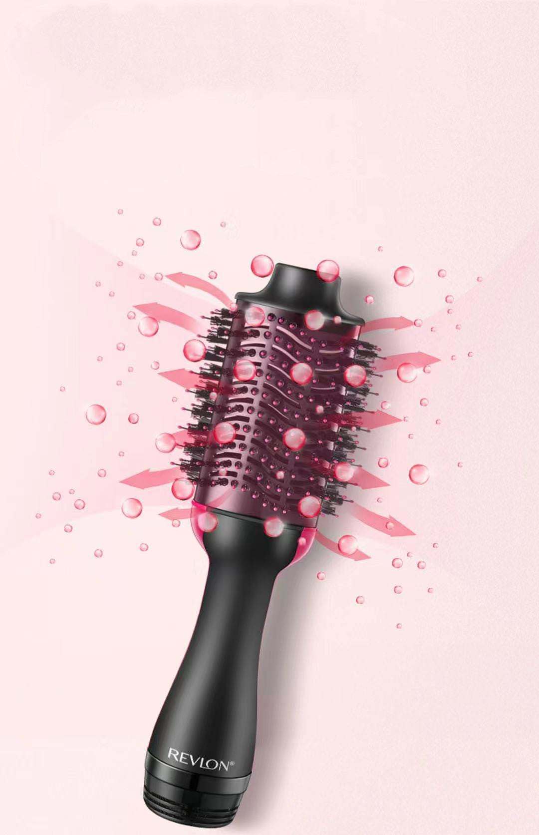 Hot Air Styling Comb with black handle, ceramic-coated barrel and dense bristles for drying and smoothing hair