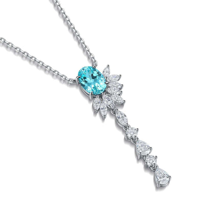 Lab-Created Gemstone Lariat Necklace in platinum-plated sterling silver with vivid aqua-blue oval and cascading clear gemstone accents