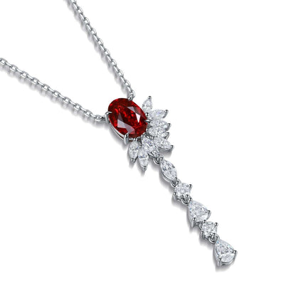 Lab-Created Gemstone Lariat Necklace in sterling silver with a red oval gemstone and cascading clear marquise and pear stones