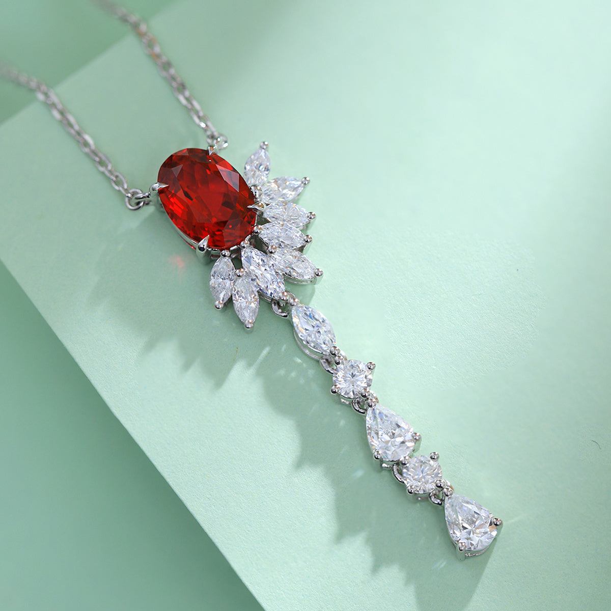 Lab-Created Gemstone Lariat Necklace in sterling silver with deep red oval stone and sparkling pear drop