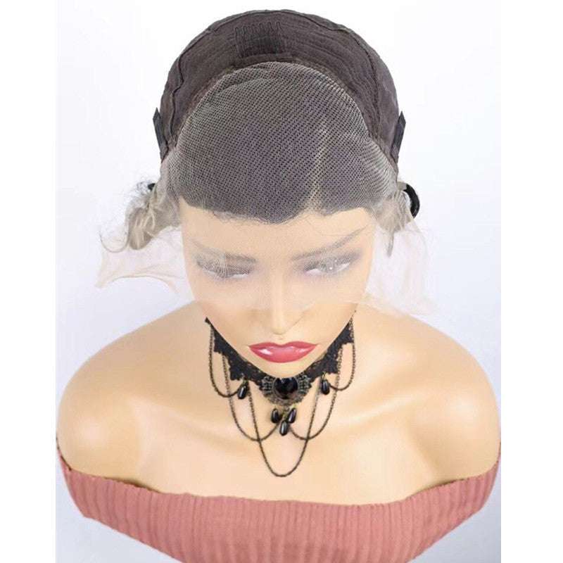 Loose Deep Wave 13x4 Transparent Lace Wig with natural dark waves, sheer lace front and visible wig cap construction
