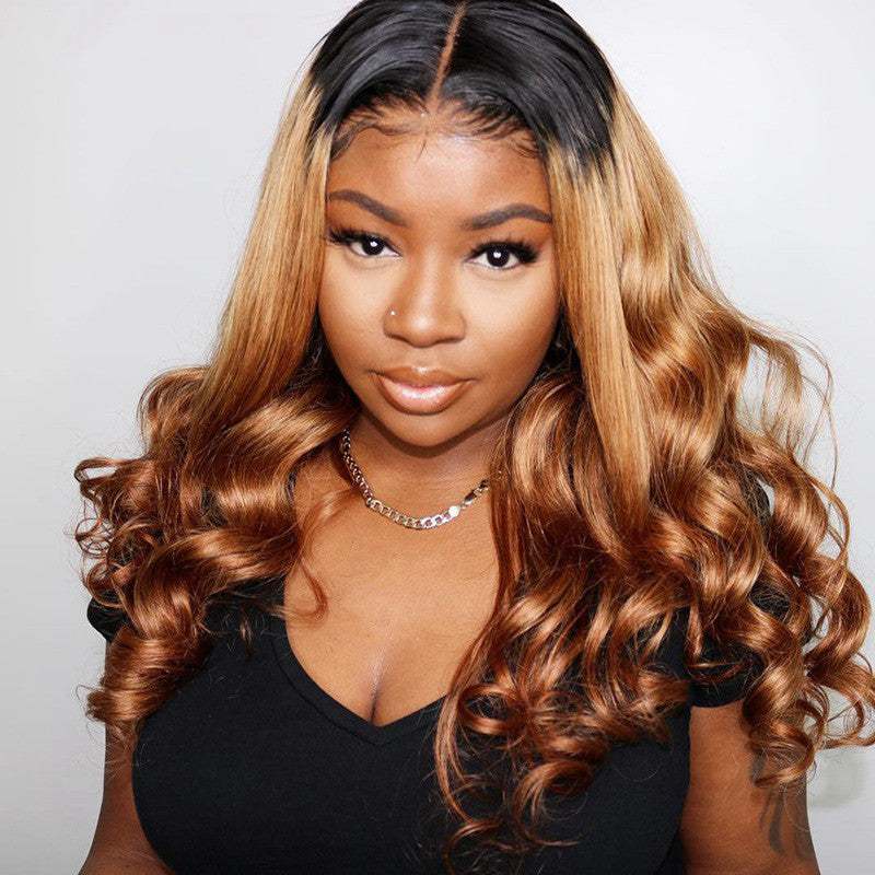 Ombre Lace Front Human Hair Wig with dark roots, honey-blonde lengths, and long glossy waves
