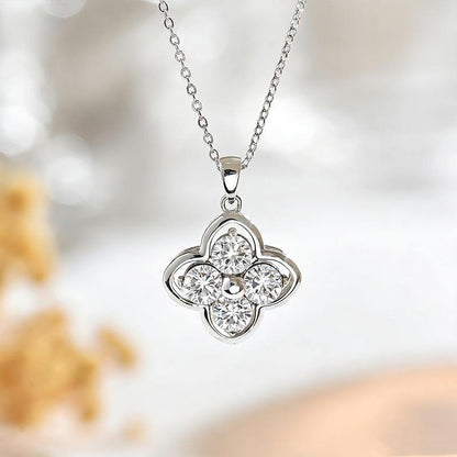 Clover necklace in S925 Sterling Silver with four clear round stones and a polished silver-tone setting