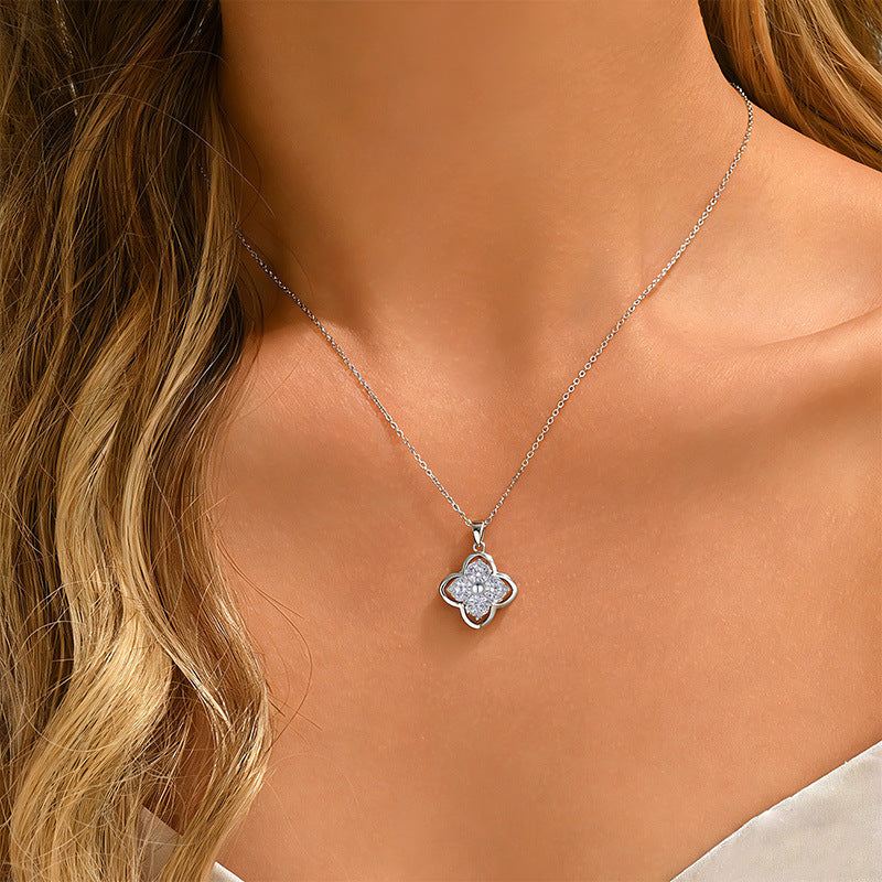 Clover necklace in S925 Sterling Silver with a silver-toned chain and sparkling four-stone floral pendant