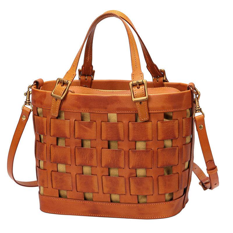 Soft Cowhide Messenger Bag in warm brown leather with woven openwork panel, top handles and adjustable shoulder strap